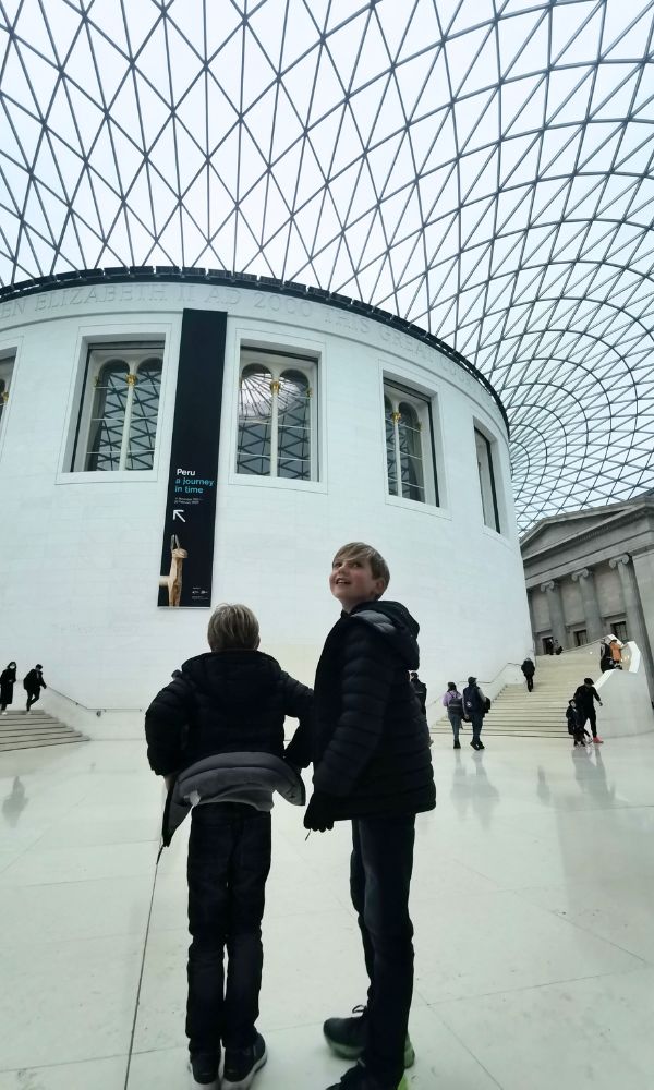 Kids in the main hall of the British Museum in London.