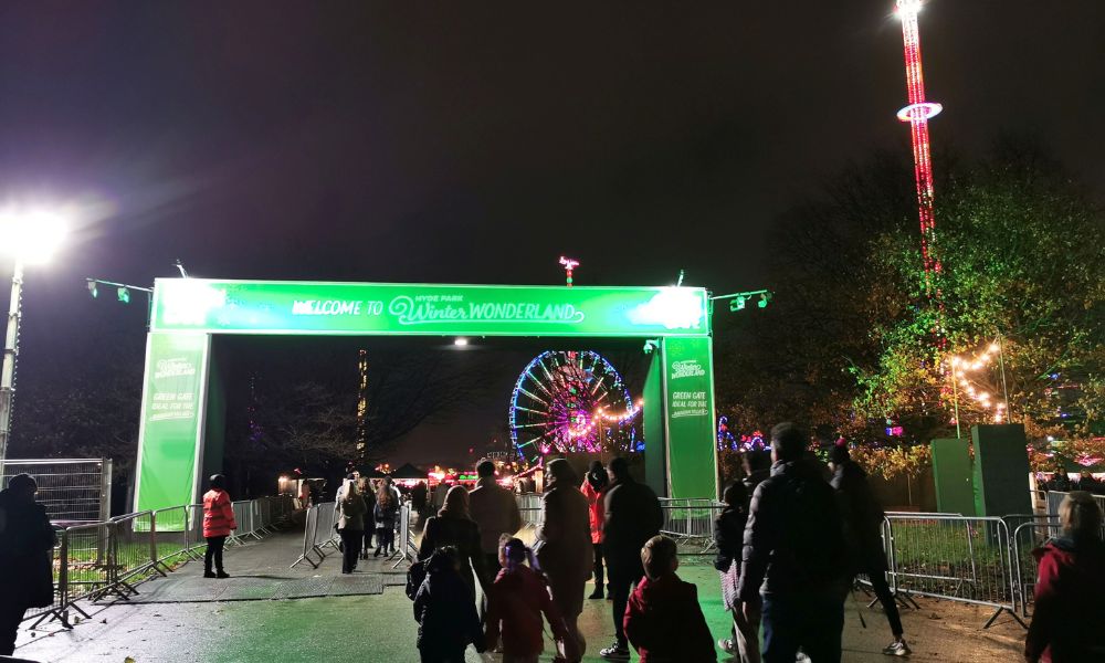 The entrance to Hyde Park Winter Wonderland lit up at night.